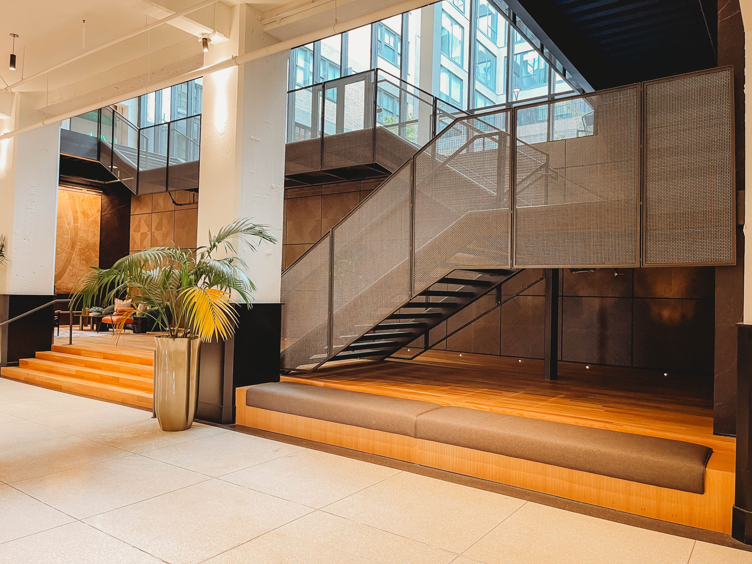 The Victor — 1717 Olive grand entry stair by Imperial Metal Company